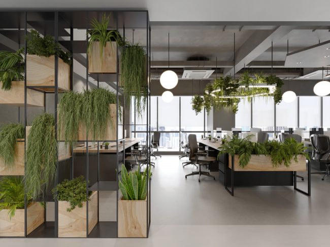 Nachhaltigkeit Unternehmensalltag - Ein modernes Büroinnenraumdesign mit integrierten Pflanzenregalen, hängenden Gärten und grünen Pflanzen auf den Schreibtischen, das ein umweltfreundliches Arbeitsumfeld fördert.